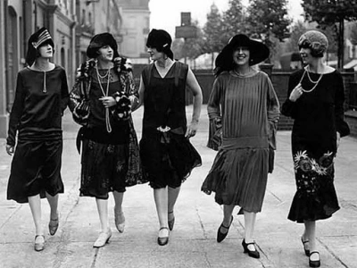 Image of women wearing flapper dresses in the 20's