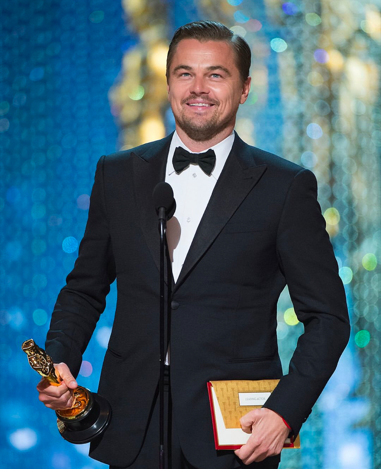 Leonardo DiCaprio, new Rolex brand ambassador, on stage at the Oscars